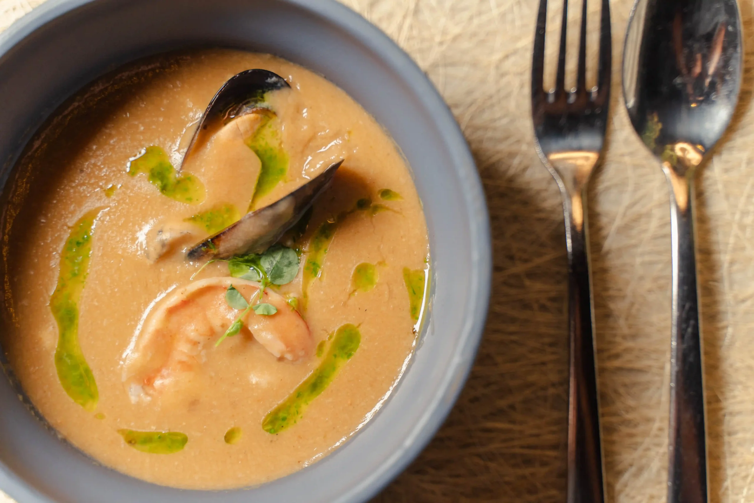 The Bullabesa is a rich seafood soup inspired by the family of Chef David Amoros's wife, Ivone Romera