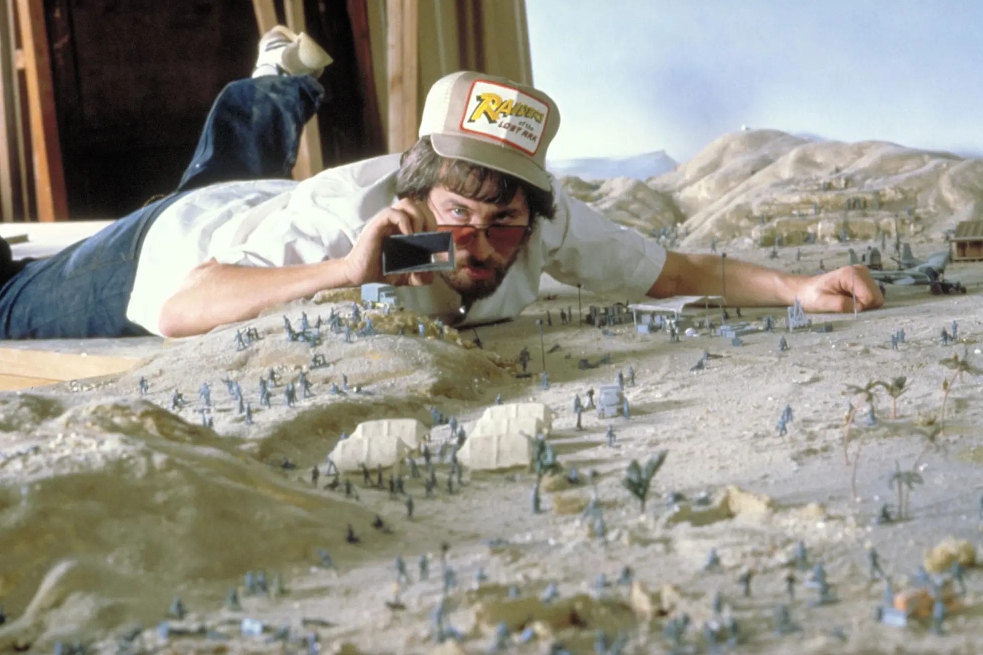 Steven Spielberg on the minature set of "Raiders of the Lost Ark"
