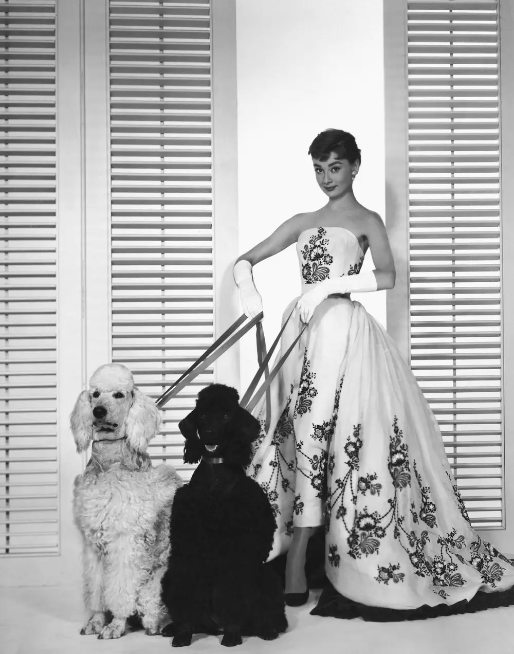 Promotional material from the 1954 film Sabrina, which marked the first collaboration between Audrey Hepburn and Hubert de Givenchy