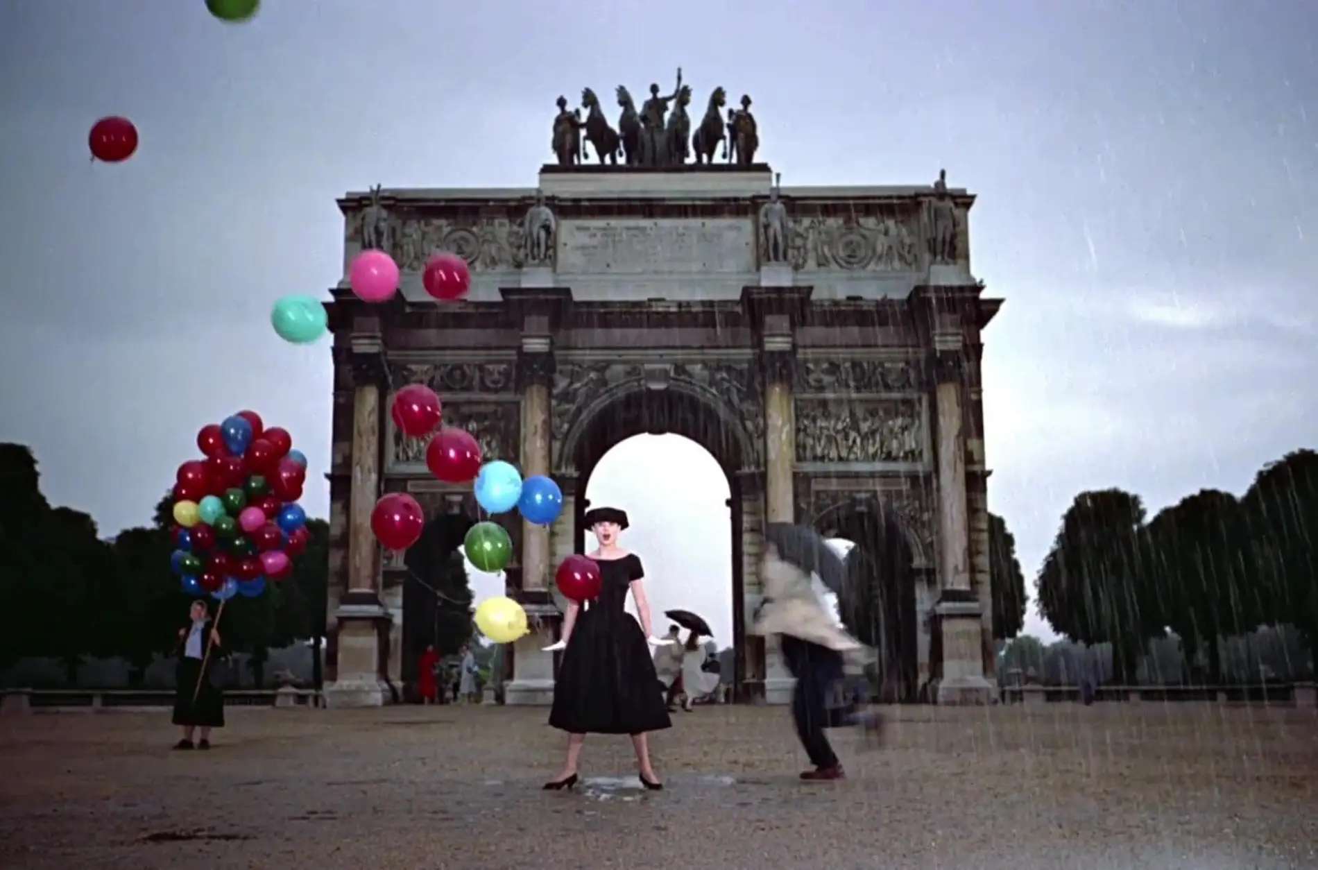 The glorious film musical Funny Face finds Audrey Hepburn wearing Givenchy creations all over Paris