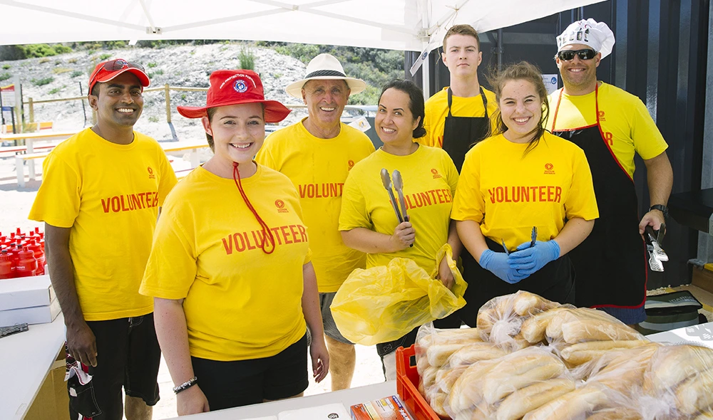 Surf life saving volunteers in patrol uniform