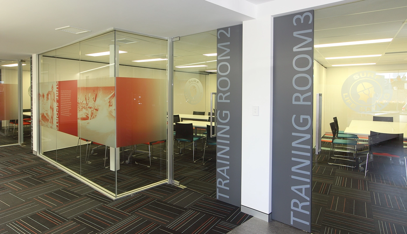 A Surf Life Saving WA training room with glass signage