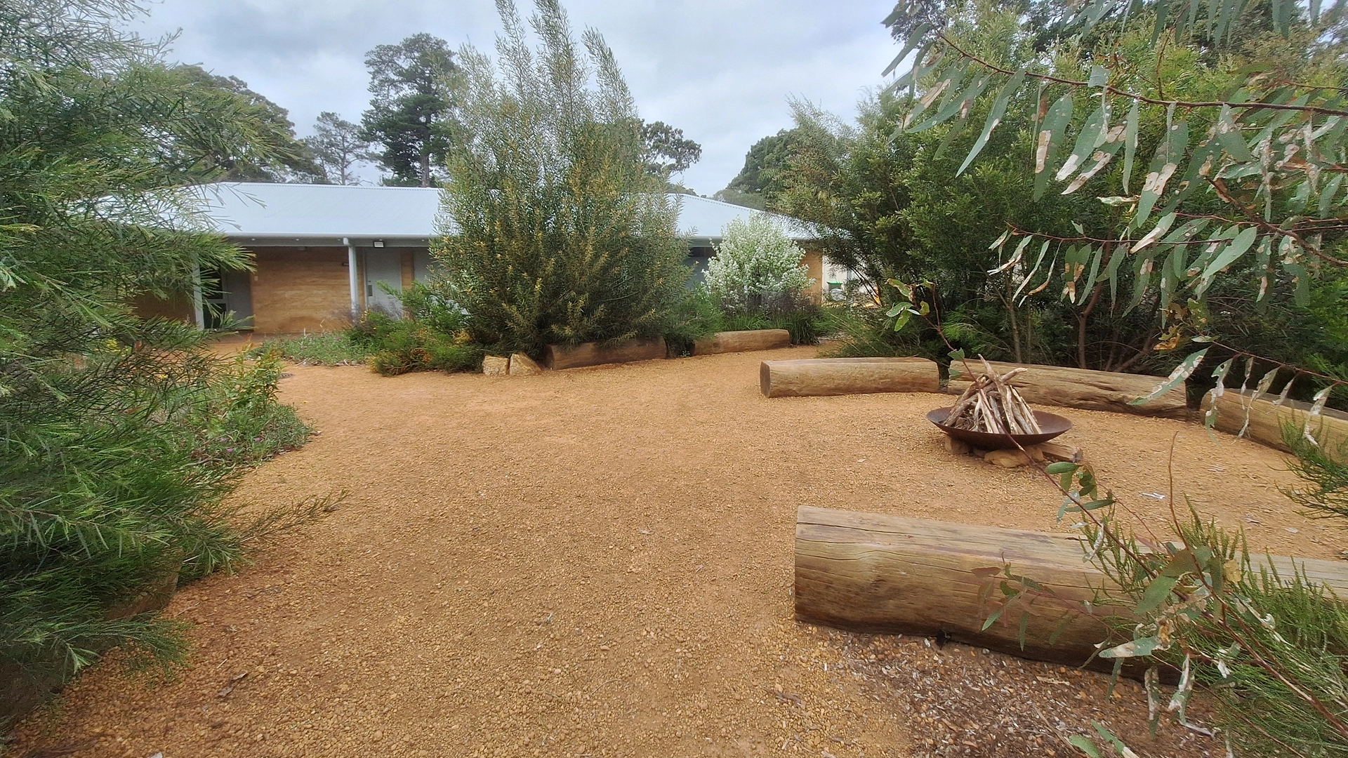 Outdoor grounds and fire pit area at the South West Recreational Camp