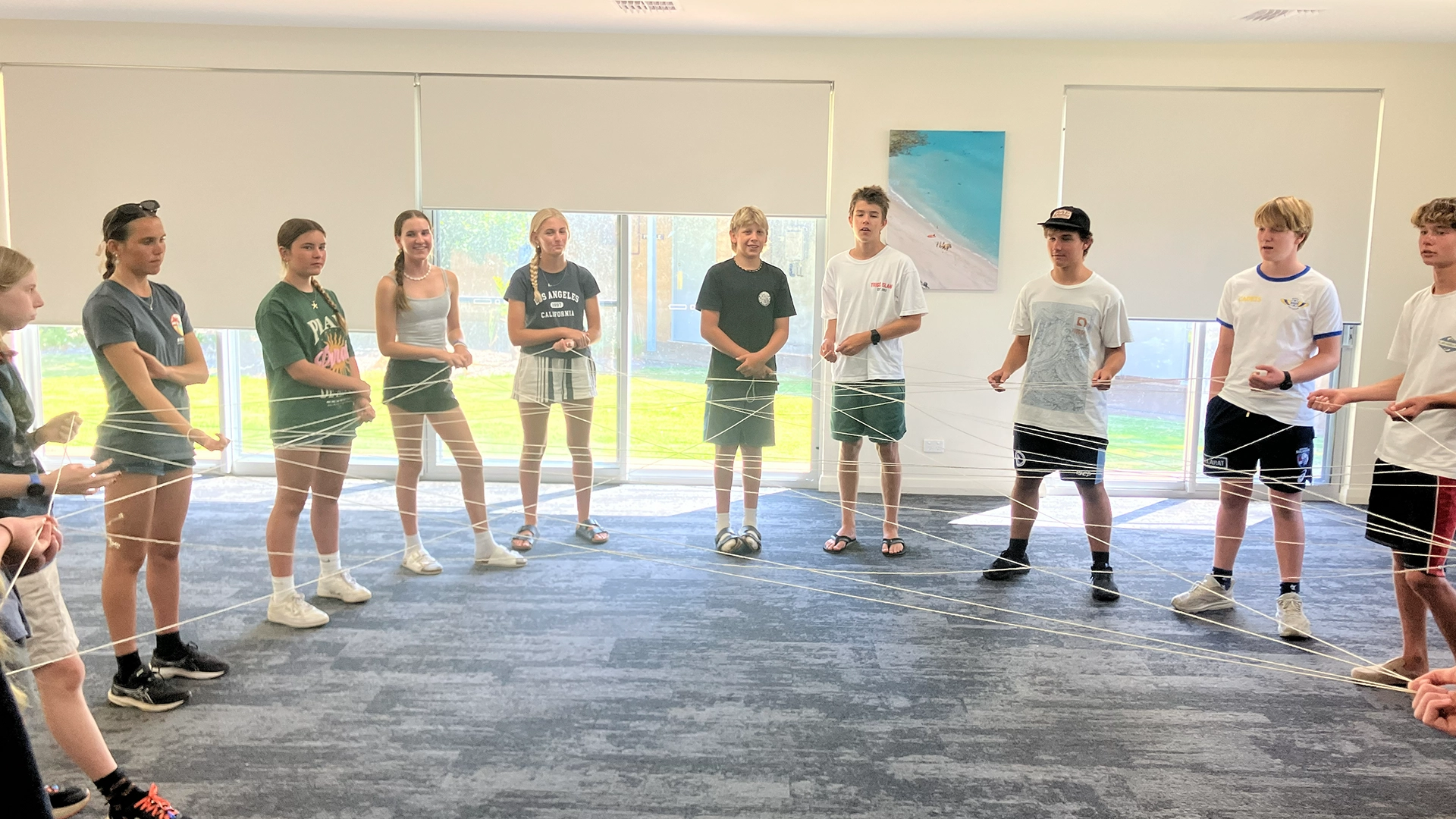 Youth camp participants taking part in an indoor activity