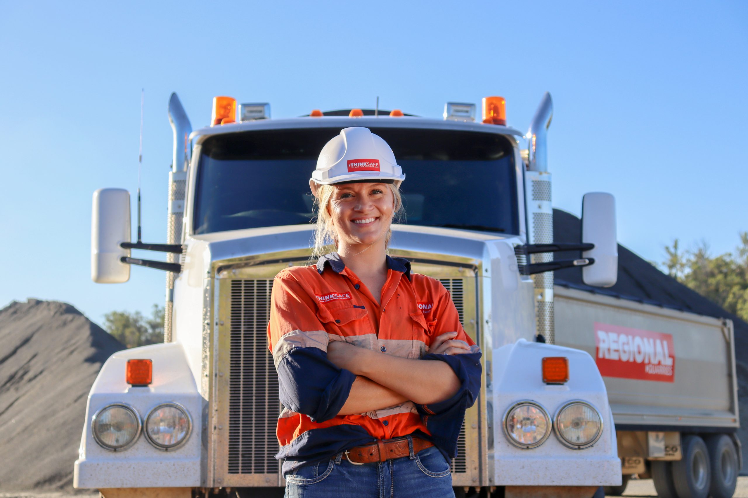 Regional Group Australia truck and worker at a quarry site.