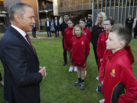 Premier Roger Cook with students from Manning Primary School at the new RTS exhibition at Curtin University.