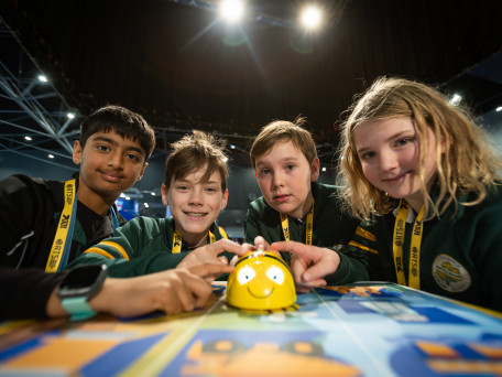 Dhruv Agrawal (11), Blake Misur (11), Ethan Shahar (11) and Emeline Hughes (11) win a challenge at the Resources Technology Showcase at PCEC