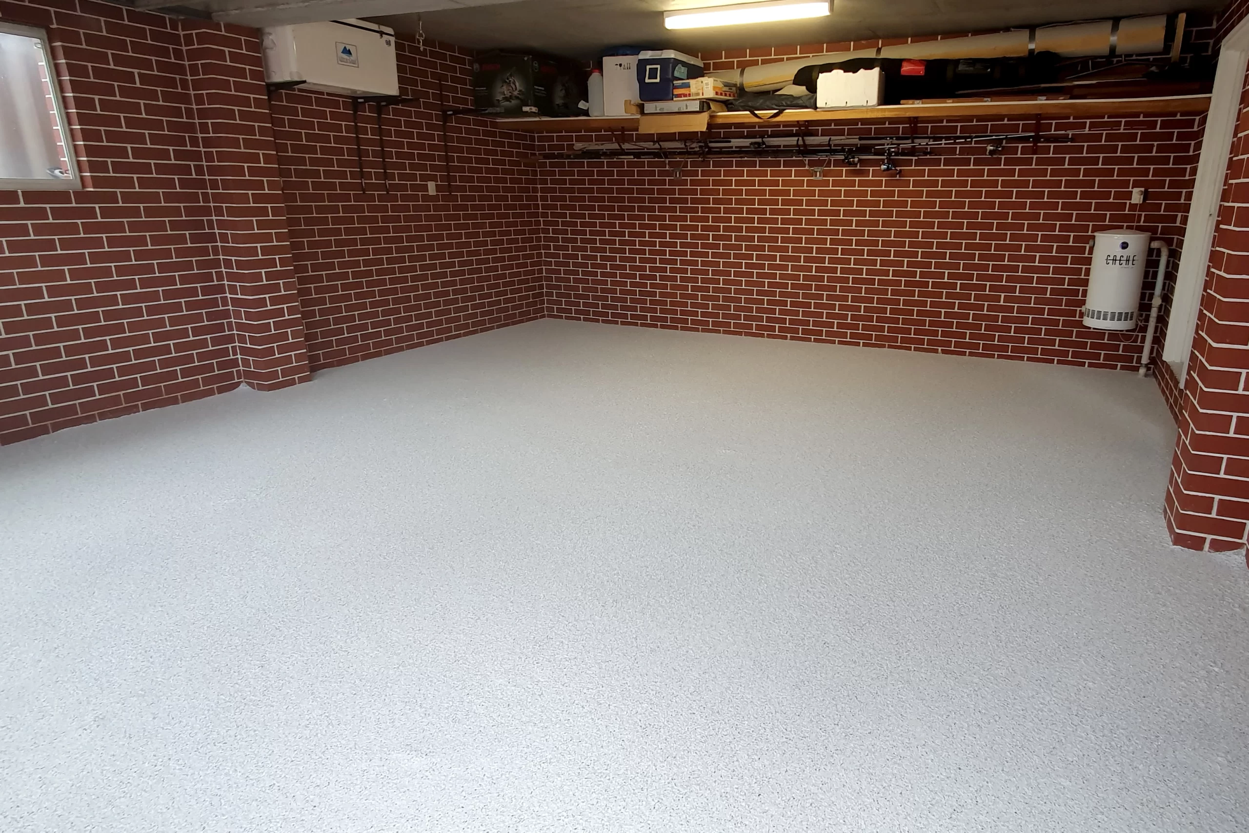 Light grey flake epoxy floor in a double garage