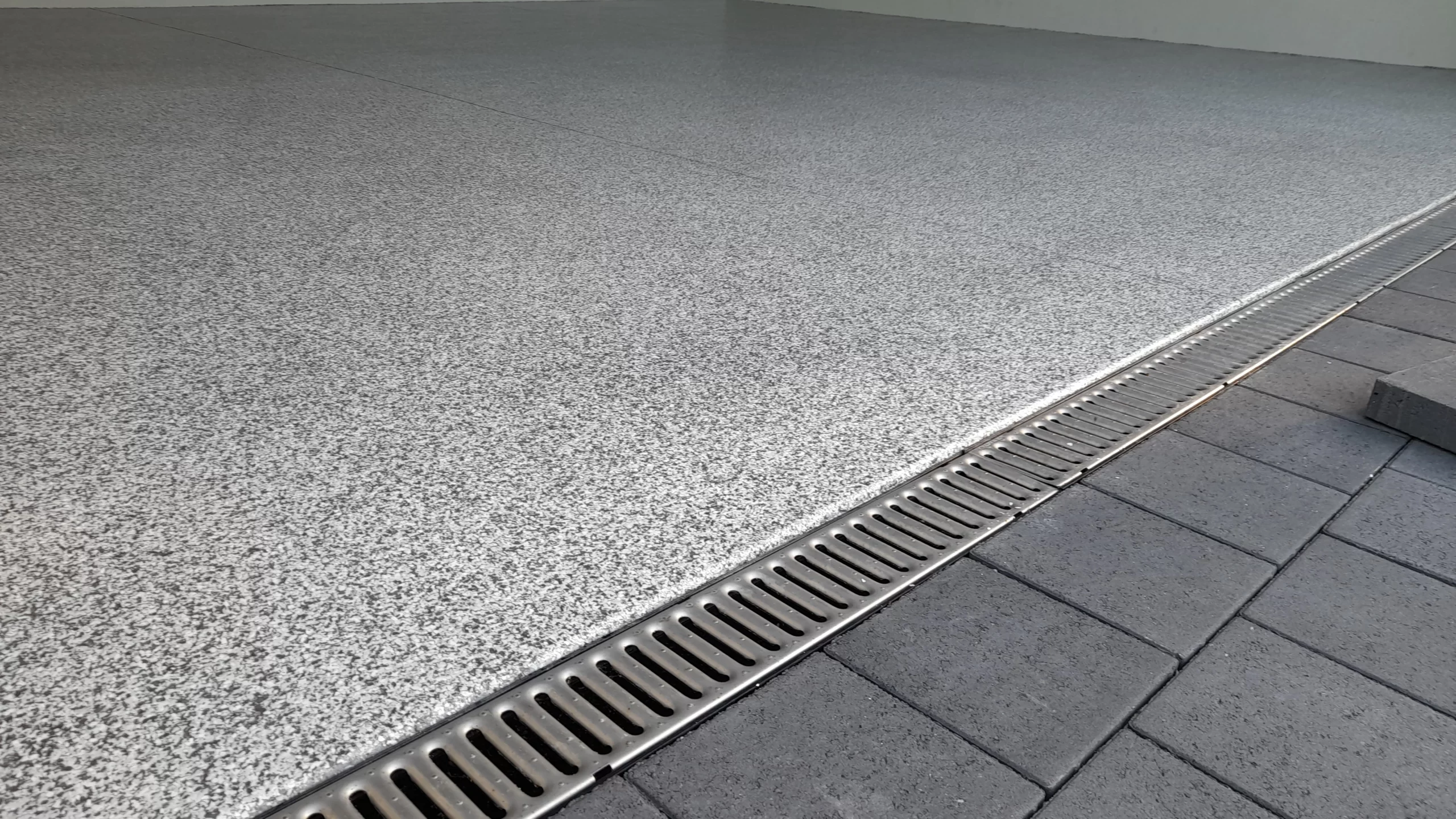 Light grey epoxy floor in double garage