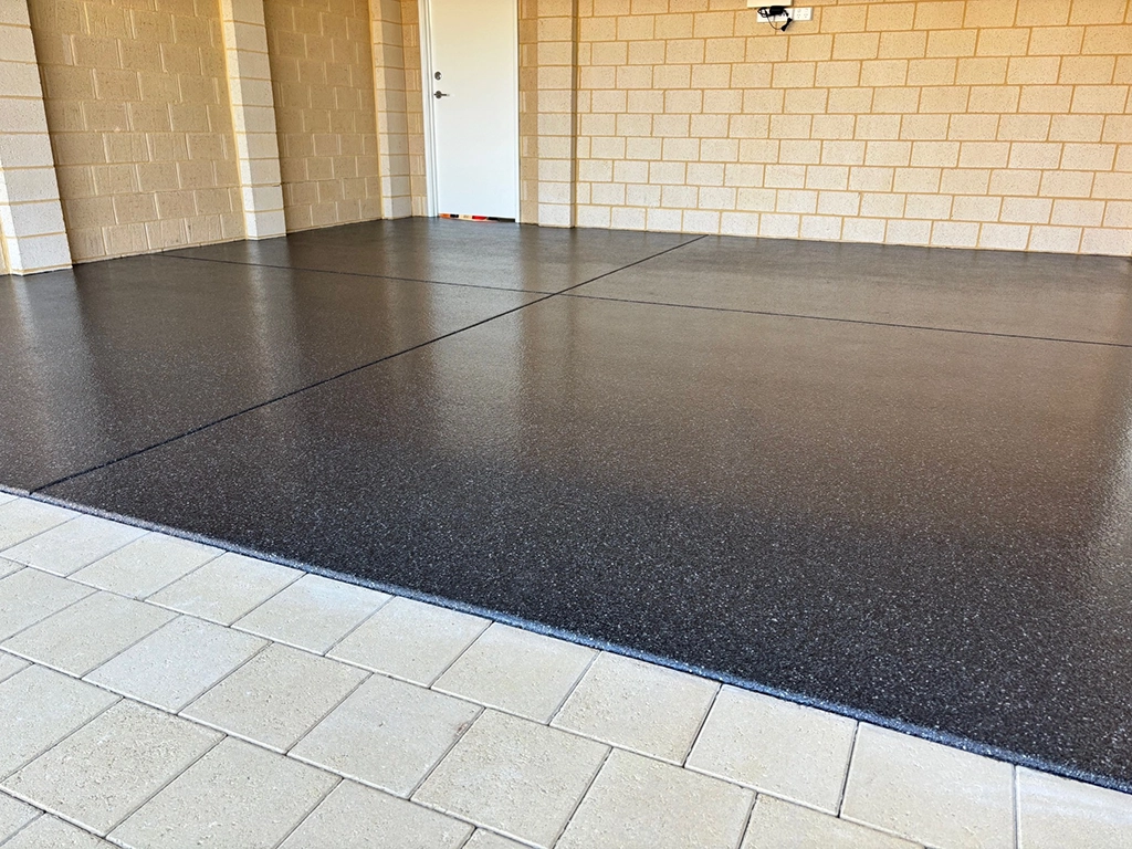Black granite epoxy floor applied to a double garage