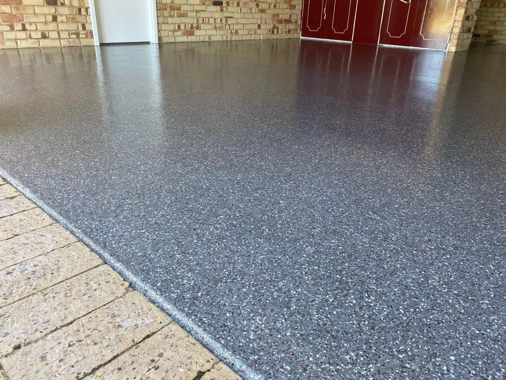 Grey epoxy floor applied to a double garage