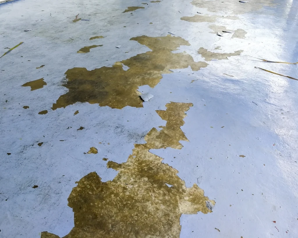 Epoxy flooring applied to concrete substrate peeling off
