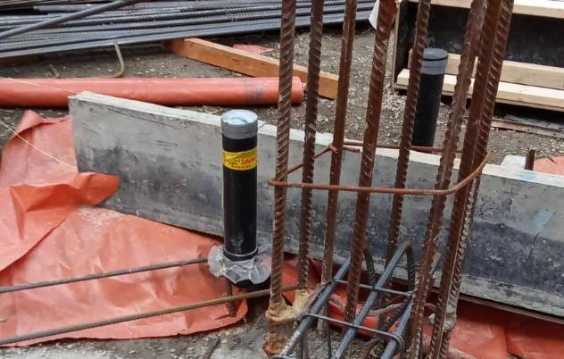 A Termiflange installed around a typical penetration before a slab pour