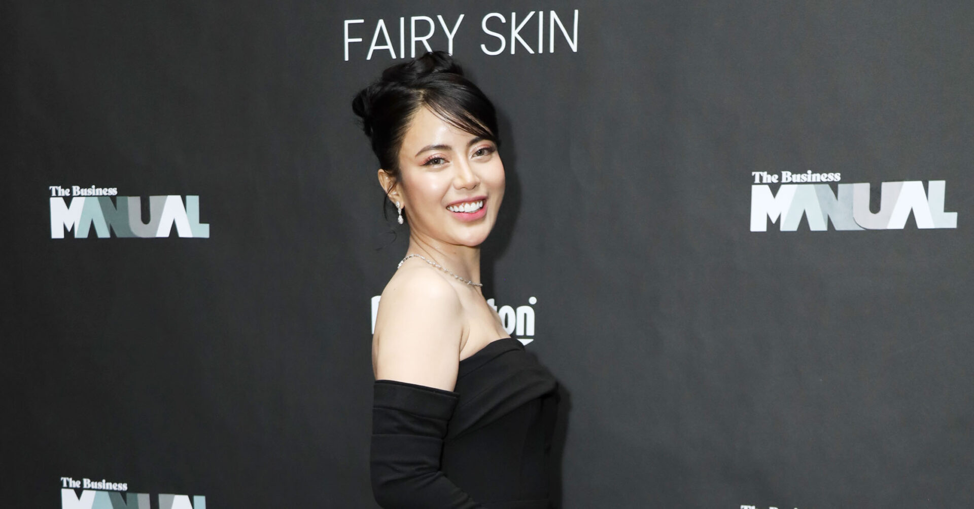 Fairy Skin CEO Kimberly Ponce-Israel wearing a black long-sleeve dress at the CEO Awards 2024.