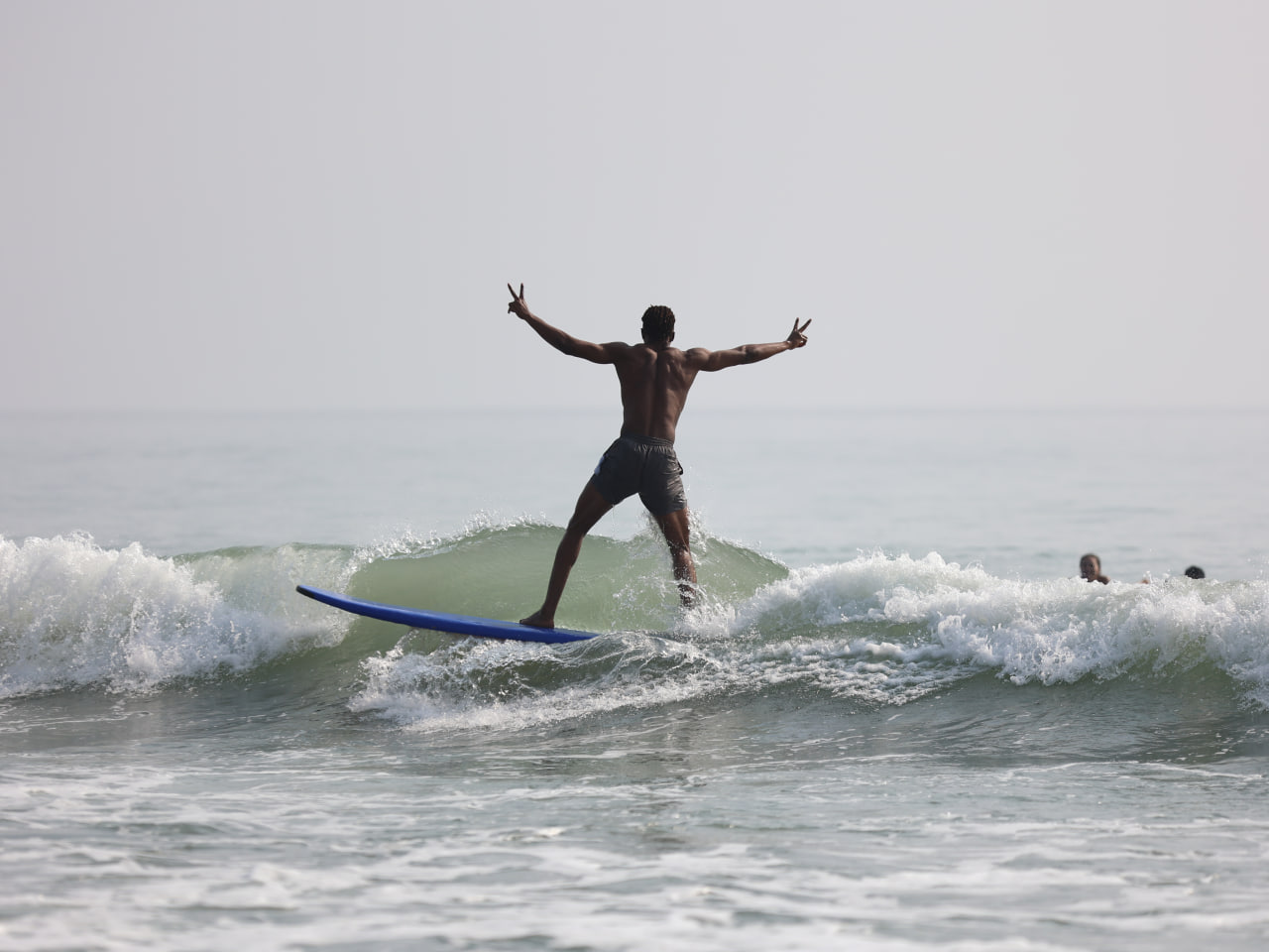 NU Bulldog Obed Mukaba riding the waves in Baler at #TheGAMESummer