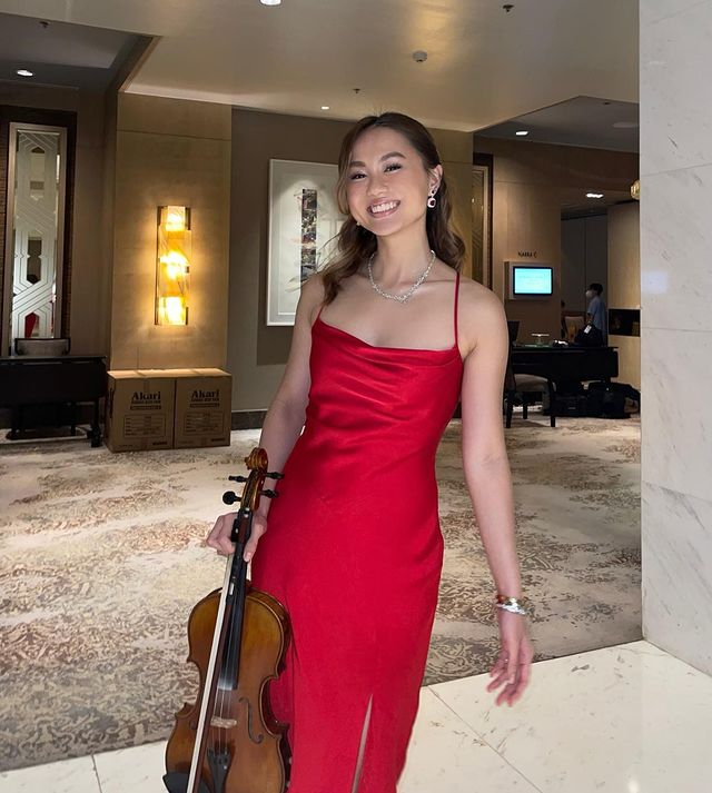 Filipina fencer Maxine Esteban plays the violin 