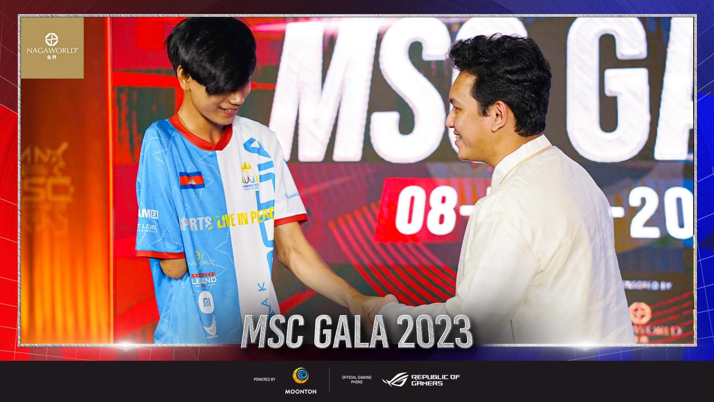 ECHO's KarlTzy shaking hands with Cambodian Para Games Athlete Phearak