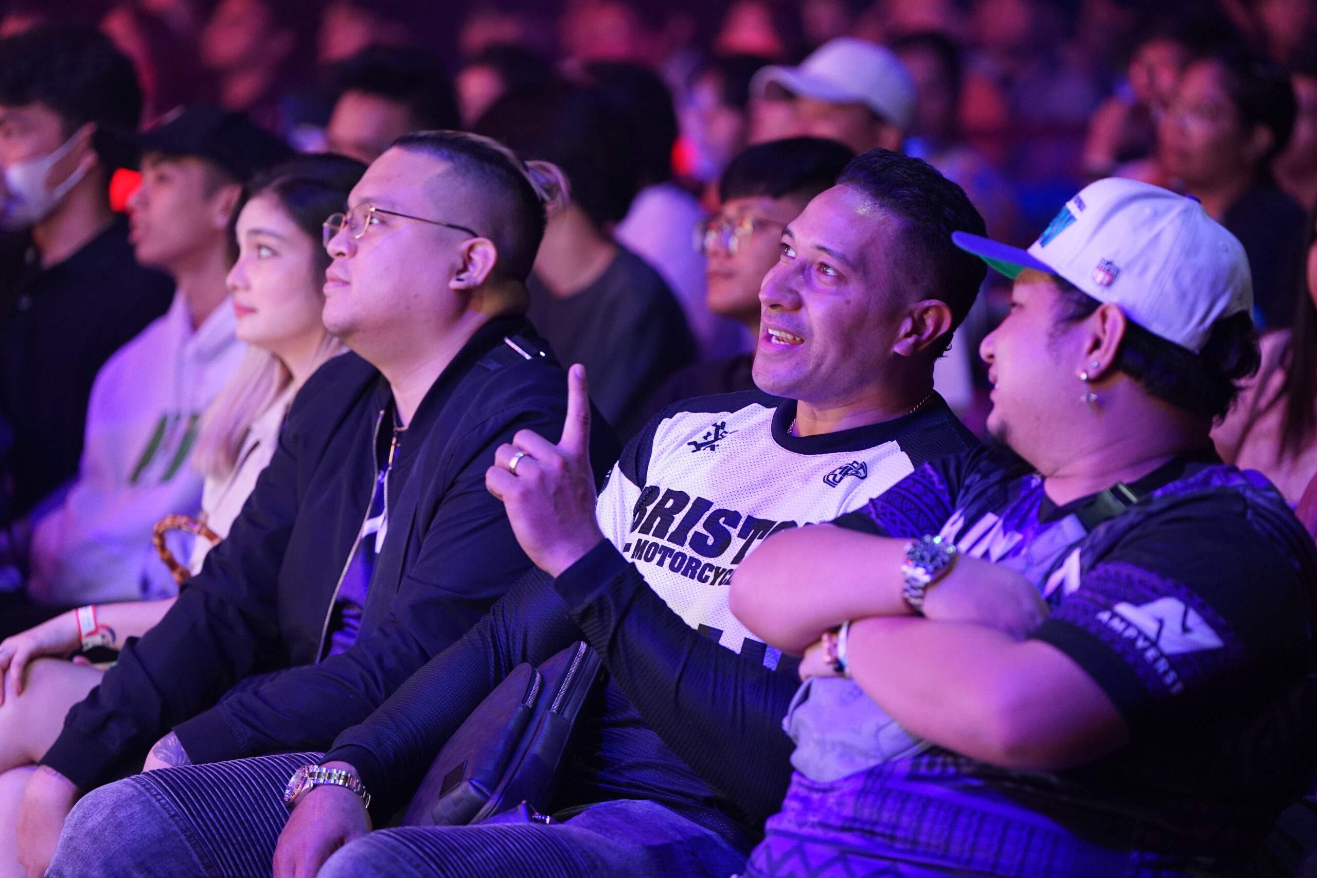 Eric "Eruption" Tai watches the MPL live with friends.