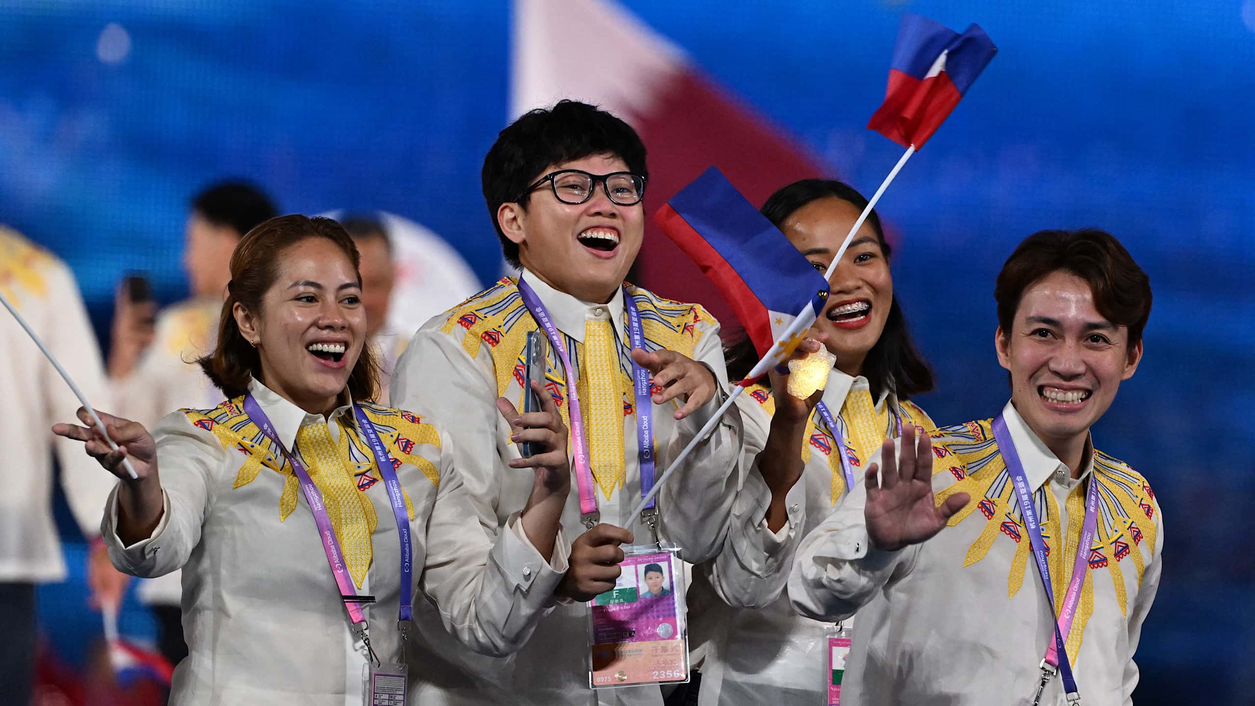 Filipino athletes wearing Puey Quinones' Barong Tagalog designed for Team Philippines for the 19th Asian Games