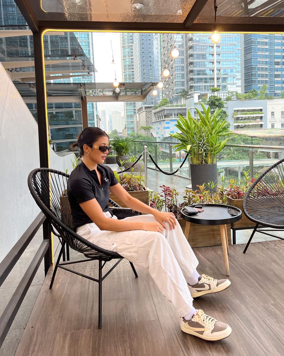 Kim Kianna Dy wearing Air Jordan 1 Low x Travis Scott in 'Reverse Mocha'