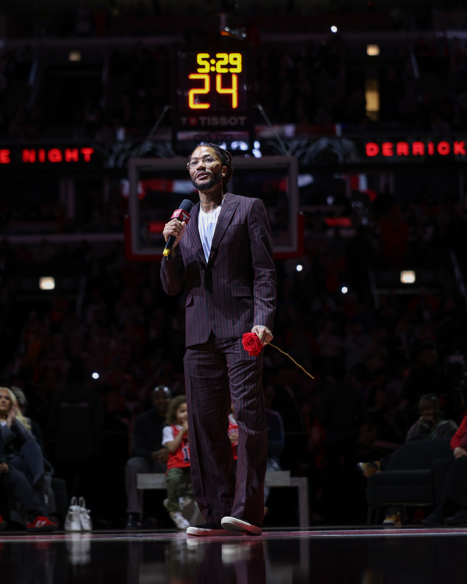 Derrick Rose gives his speech during halftime.