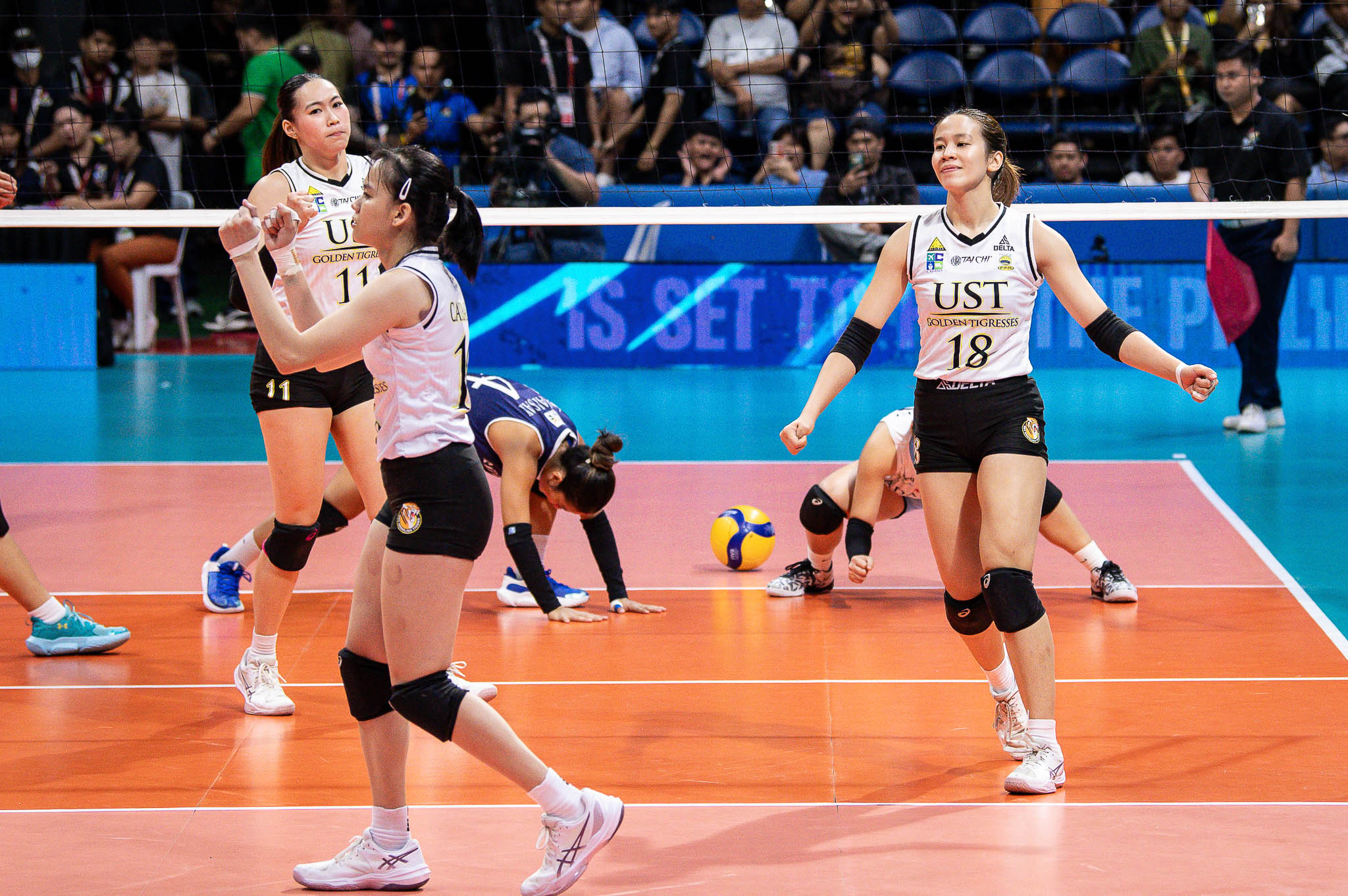 A shot of UST's Reg Jurado along with Pia Abbu and Cassie Carballo