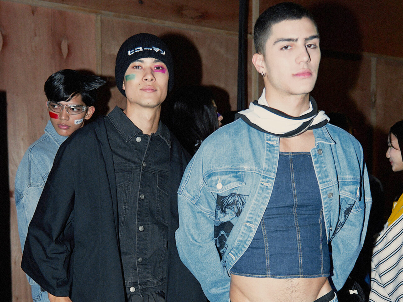 Denim on denim outfit for men. Denim jacket on top of a denim corset.