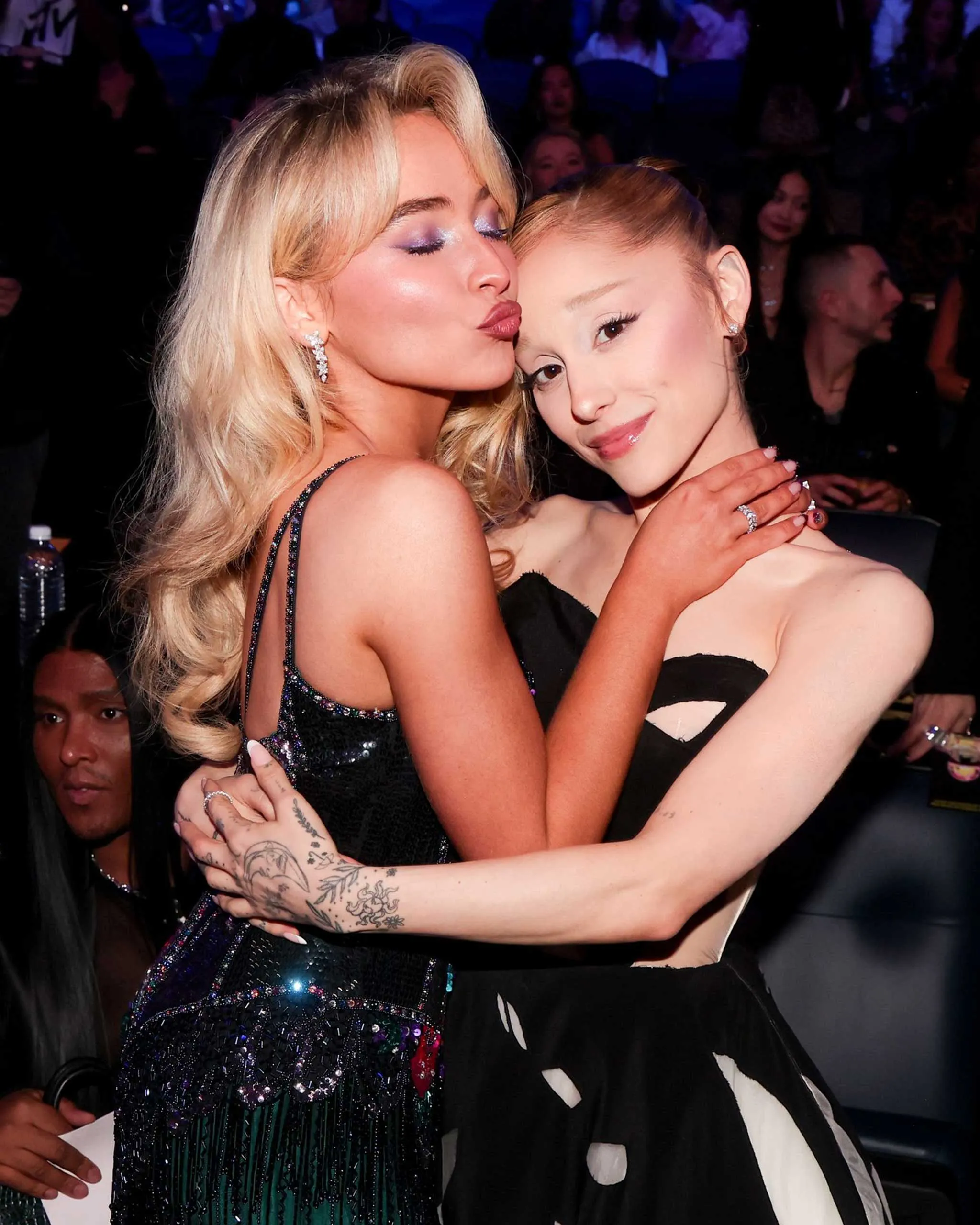 sabrina carpenter and ariana grande hugging at the VMAs