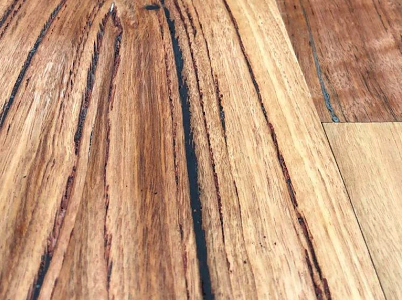 Book matched reclaimed hardwood with an oil finish Recycled Timber Innovations