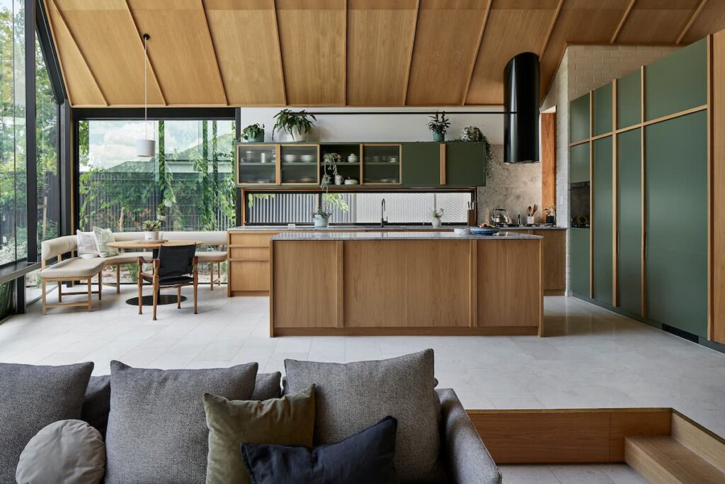 The design of this kitchen owes much to its architecture, featuring generous but not oversized proportions, timber-lined gabled ceilings, and copious glazing that creates an indoor-outdoor connection. | Designed by Ashley Halliday Architects | Photography: Anthony Basheer