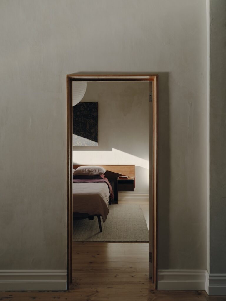 Layered plaster reinforcing original cottage walls with a softened finish, photographed for green magazine issue 106: Embroidered by Tom Ross.