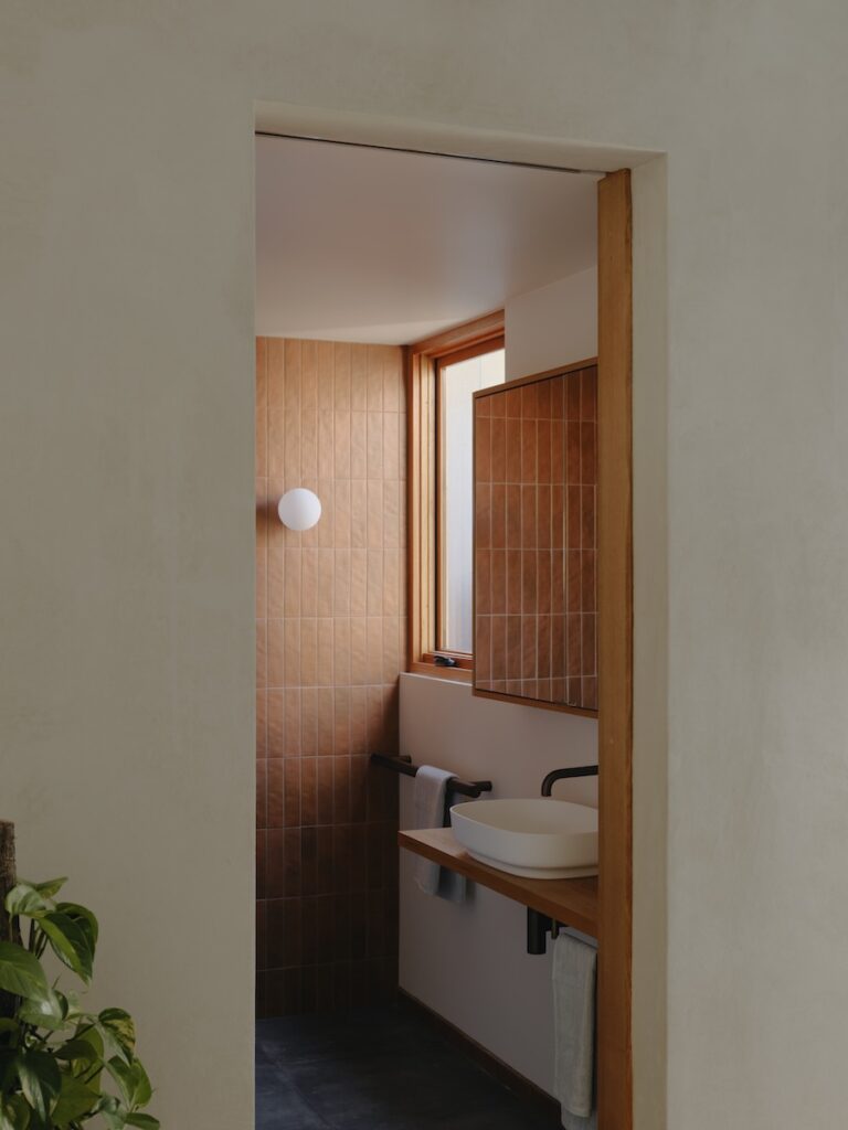 Raw cement, timber and metal materials left uncoated for natural expression, photographed for green magazine issue 106: Embroidered by Tom Ross.