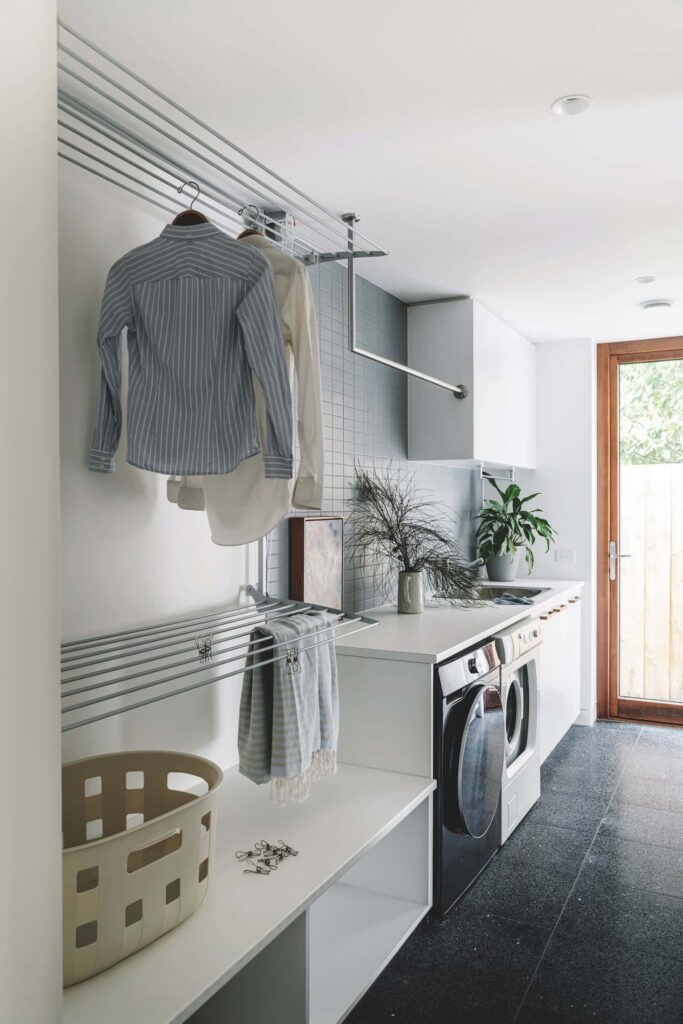 The hardworking laundry provides light and functionality for five, photographed for issue 107: Creature Comforts by Marnie Hawson.
