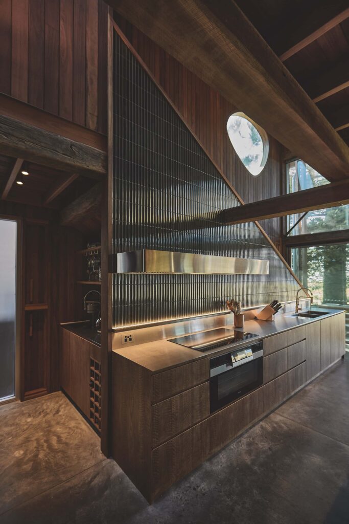 The kitchen is practical, with materials leaning to the robust, photographed for issue 107: Weather Withall by Zella Casey Brown.