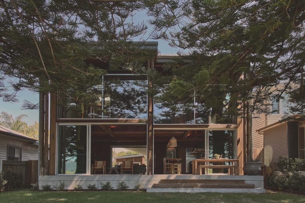 The main pavilion sits atop a concrete plinth, slightly elevating the home to aid with tidal surges, photographed for issue 107: Weather Withall by Zella Casey Brown.