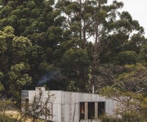 Louvred windows at the end of the indoor walkway and bathroom pull cooling bay breezes through the house, photographed for issue 107: Assemblage by Adam Gibson.