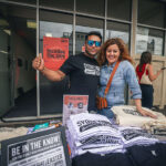 The Sydney Road Brunswick Association (SRBA) selling Sydney Road Brunswick tee shirts and totes at the Sydney Road Street Party.