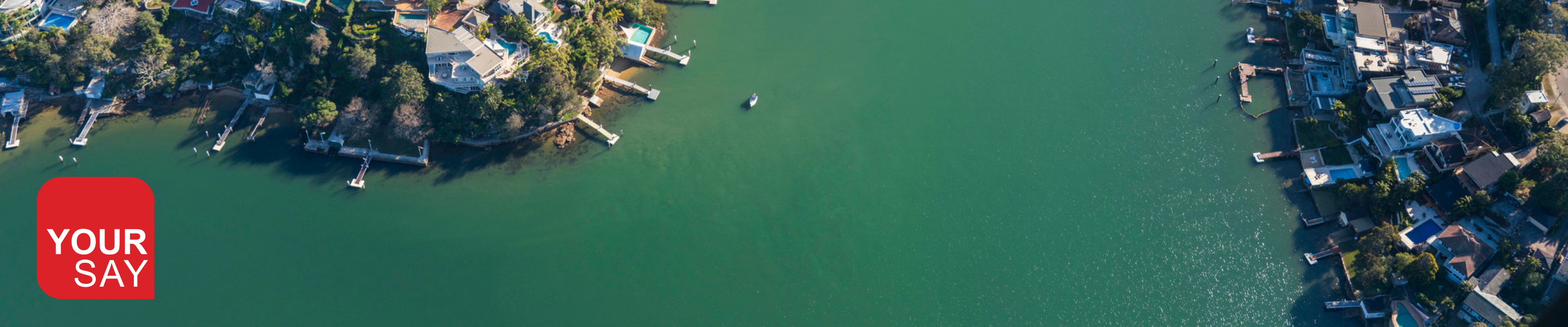 A teal background with red and cream coloured splashes, with the text "humans of Georges River"