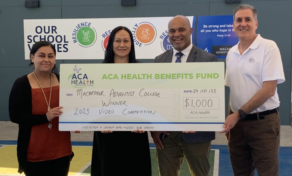 macarthur macarthur adventist christian private school Sydney recognised for creative health videos promoting wellbeing - staff with giant check
