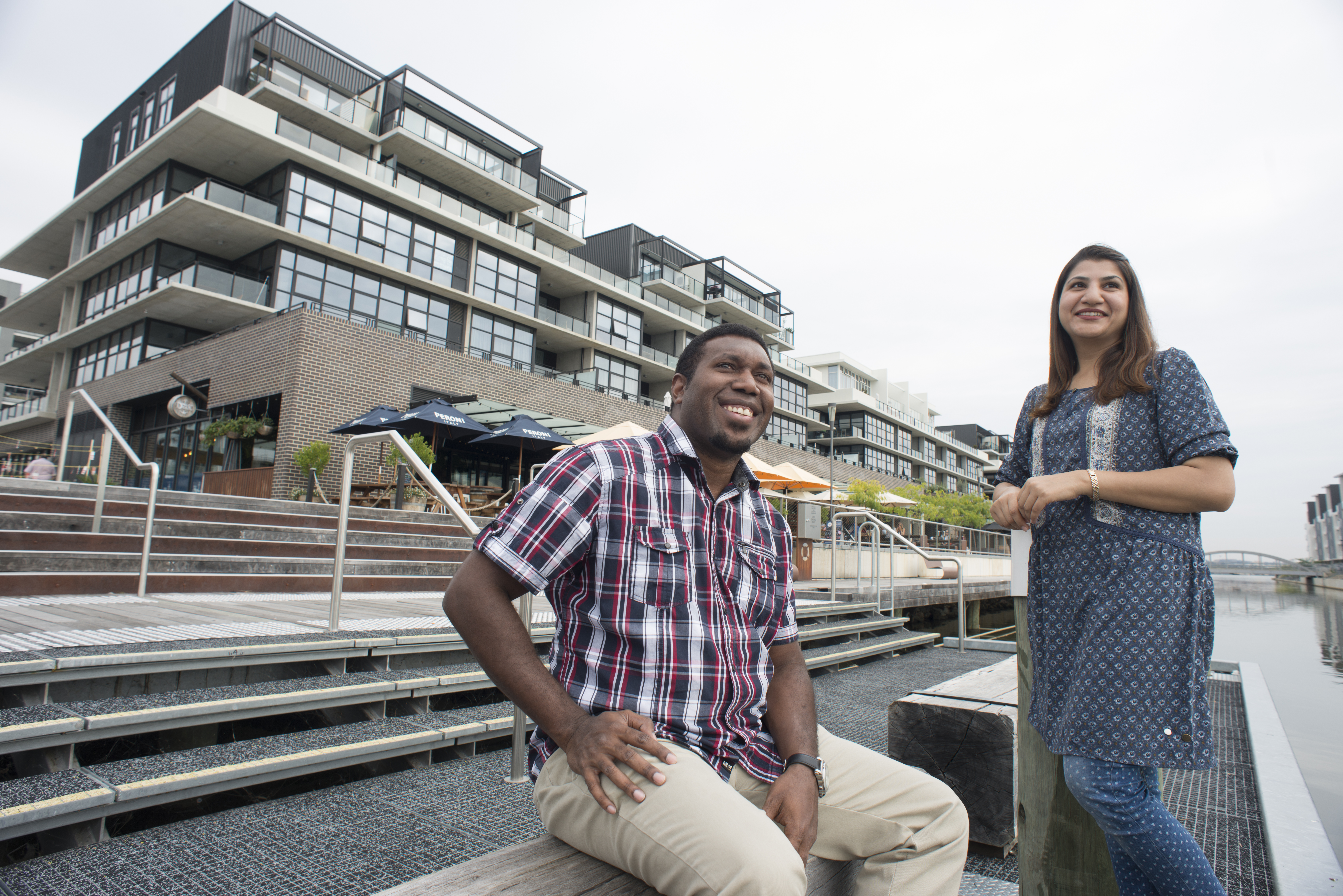Image of two people at the Kingston foreshore.
