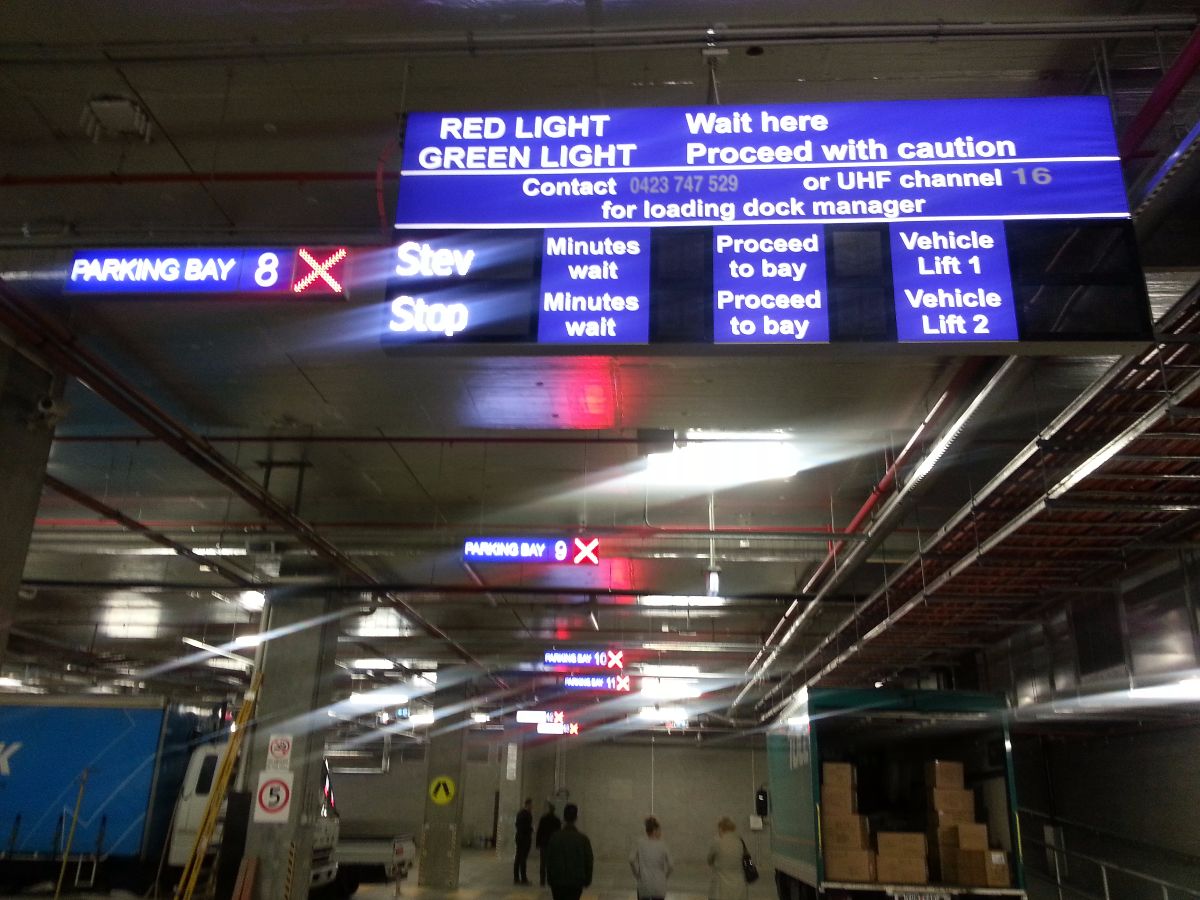 Photo of loading bays with signs reading