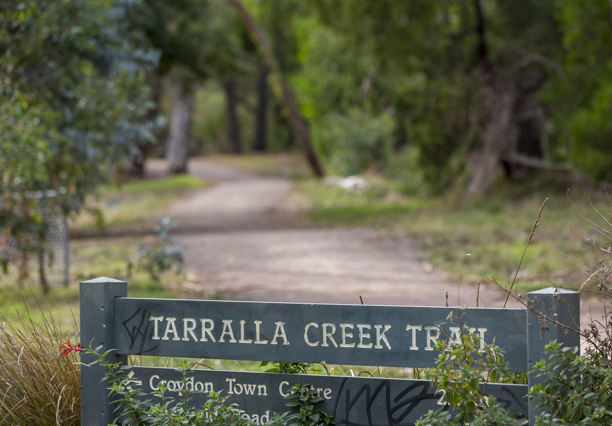 Phot of a path and sign along Tarralla Creek