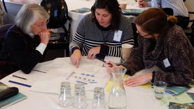 Image of participants discussing collaboration