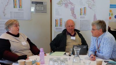 Image of participants discussing collaboration