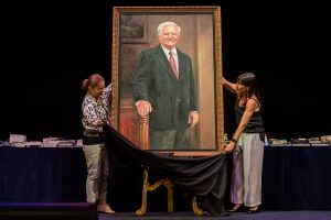 Unveiling of the portrait of Reg St Leon at 2018 Speech Night