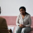 A woman asking questions about the mental health waiting period exemption