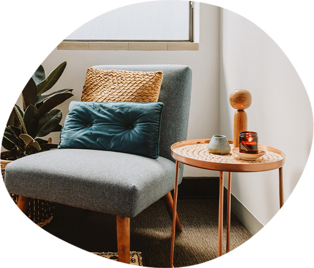A grey armchair in a therapy room in Melbourne