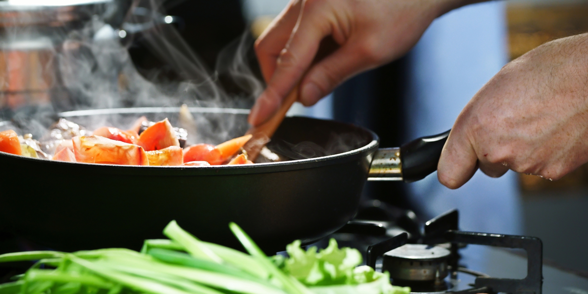 Cook more, waste less workshop with Foodbank WA and the Western Metropolitan Regional Council (WMRC) banner. The banner consists of an image of a close up of someone cooking with a pan of carrots