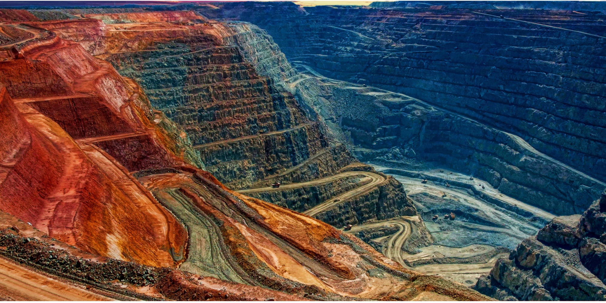 In-person autism workshops in Kalgoorlie with the Autism Association of WA banner. The banner consits of an image of the Kalgoorlie Super Pit