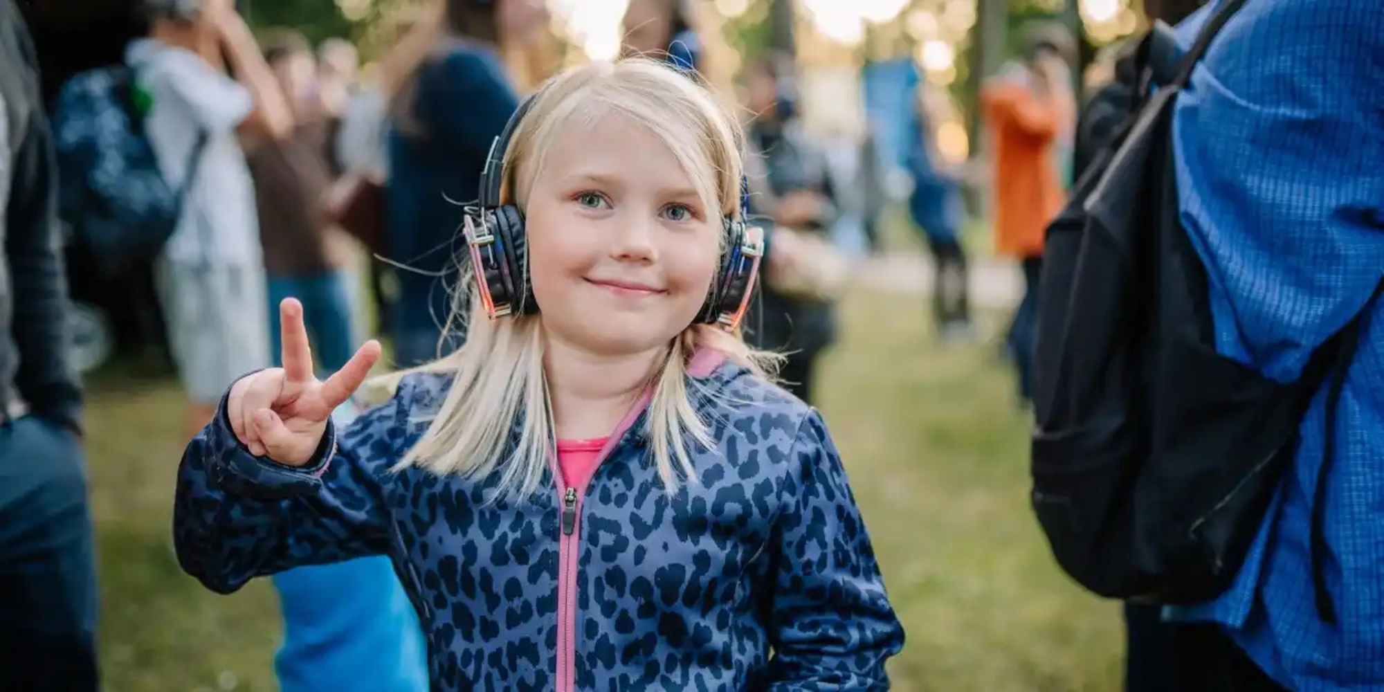 Let get Loud: Silent Disco with the City of Vincent banner. The banner consists of an image of a girl wearing silent disco headphones at a park filled with people.